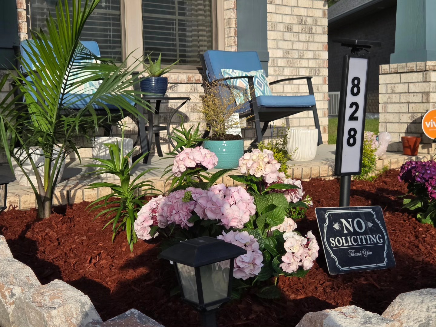 Flower bed makeover with fresh mulch